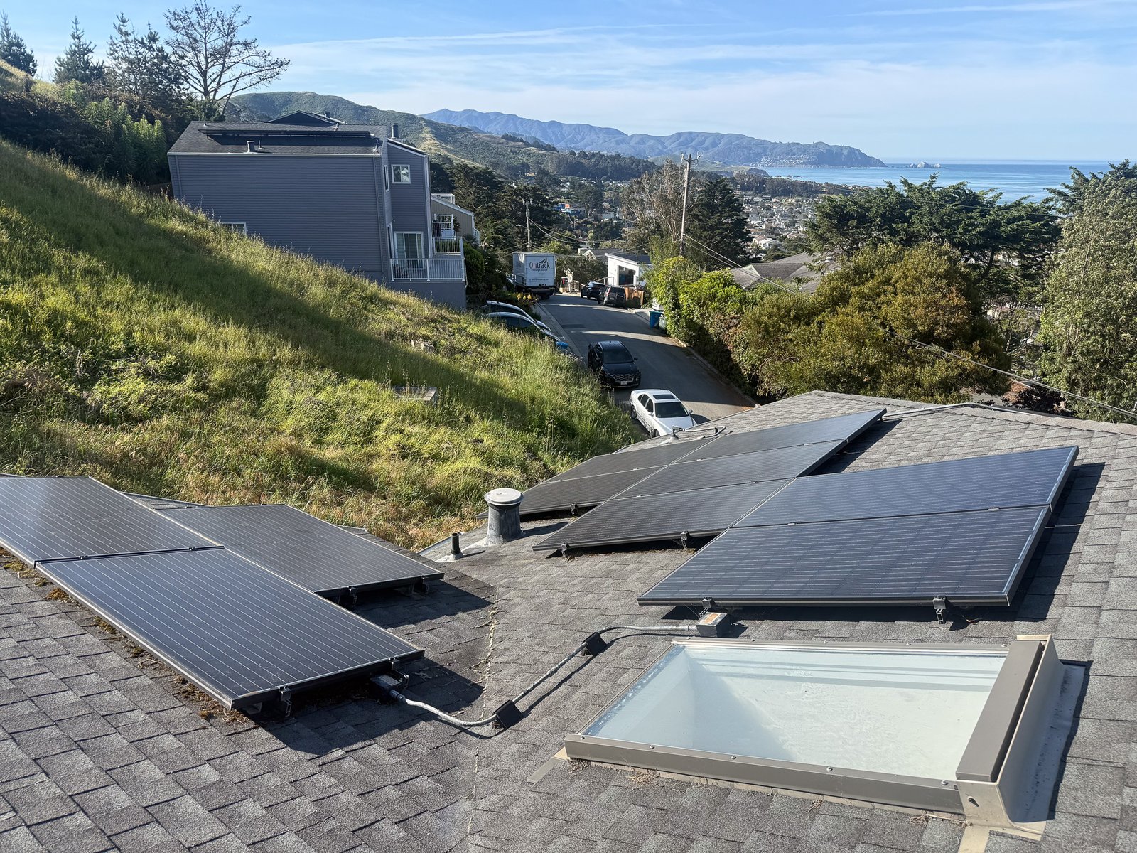 Dirty solar panels covered in dust and pollen before professional cleaning